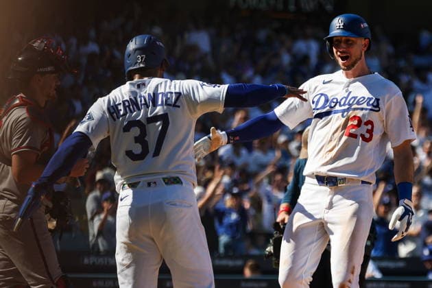 MLB, Baseball Herren, USA National League Division Series - Dodgers vs Braves Game 1 Los Angeles Dodgers outfielder Kyle Tucker (R) celebrates with outfielder Teoscar Hernandez (L) after hitting a two-run home run during the sixth inning in Game 1 of the National League Division Series between the Atlanta Braves and the Los Angeles Dodgers at UNIQLO Field at Dodger Stadium in Los Angeles, California, USA, 03 October 2026. LOS ANGELES CALIFORNIA UNITED STATES  Copyright: xCHRISxTORRESx