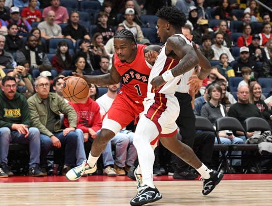 October 3, 2026, Quebec, On, Canada: Toronto Raptors Jamal Shead, left, drives past Miami Heat s Davion Mitchell during NBA, Basketball Herren, USA preseason basketball action in Quebec City, Saturday, Oct. 3, 2026. Canada News - October 3, 2026 - ZUMAc35_ 20261003_zaf_c35_124 Copyright: xJacquesxBoissinotx