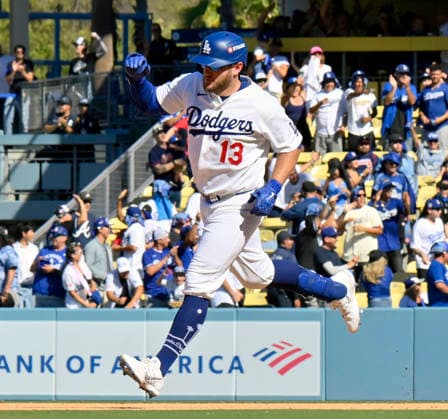 Los Angeles Dodgers Max Muncy rounds the bases after hitting a solo home run in the sixth inning against the Atlanta Braves in game one of the National League Division Series at Dodger Stadium on Saturday, October 3, 2026 in Los Angeles, California. The Dodgers defeated the Braves 5-3.  LAP20261003807 JIMxRUYMEN