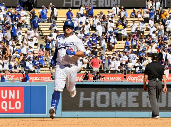Los Angeles Dodgers Max Muncy rounds the bases after hitting a solo home run in the sixth inning against the Atlanta Braves in game one of the National League Division Series at Dodger Stadium on Saturday, October 3, 2026 in Los Angeles, California. The Dodgers defeated the Braves 5-3.  LAP20261003808 JIMxRUYMEN