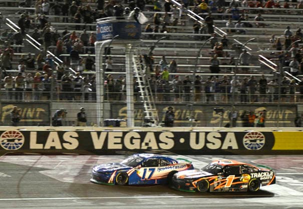 LAS VEGAS, NV - OCTOBER 03: Corey Day ( 17 Hendrick Motorsports HendrickCars.com Chevrolet) and Carson Kvapil ( 1 JR Motorsports Bass Pro Shops Chevrolet) battle for the lead as they take the white flag during the NASCAR, Motorsport, USA O™Reilly Auto Parts Series Focused Health 302 playoff race at Las Vegas Motor Speedway Saturday Oct. 3, 2026 in Las Vegas, Nevada. (Photo by Will Lester Icon Sportswire) AUTO: OCT 03 NASCAR O™Reilly Auto Parts Series Focused Health 302 EDITORIAL USE ONLY Icon26100353032