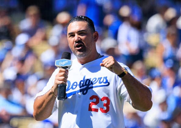 October 3, 2026, Los Angeles, California, USA: Former Dodgers first baseman AdrioÂ¡n GonzoÂ¡lez leads the crowd in the Ã¢â‚¬oeItÃ¢â‚¬â ¢s time for Dodger baseball!Ã¢â‚¬Â call before NLDS Game 1 between the Los Angeles Dodgers and the Atlanta Braves on Saturday, October 3, 2026, at Dodger Stadium in Los Angeles, California. JAVIER ROJAS PI Los Angeles USA - ZUMAp124 20261003_zaa_p124_041 Copyright: xJavierxRojasx