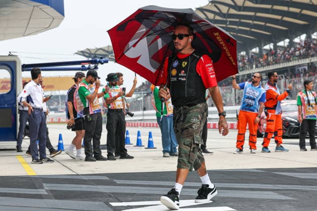SEPANG, SGR - OCTOBER 04: Lewis Hamilton of Great Britain and Scuderia Ferrari HP during driver s parade before the start of the race of the Formula 1 Gulf Air Bahrain Grand Prix on October 04, 2026 held at Sepang International Circuit in Sepang, Malaysia. (Photo by Hazrin Yeob Men Shah Icon Sportswire) AUTO: OCT 04 F1 Bahrain Grand Prix in Malaysia EDITORIAL USE ONLY Icon3782610042656