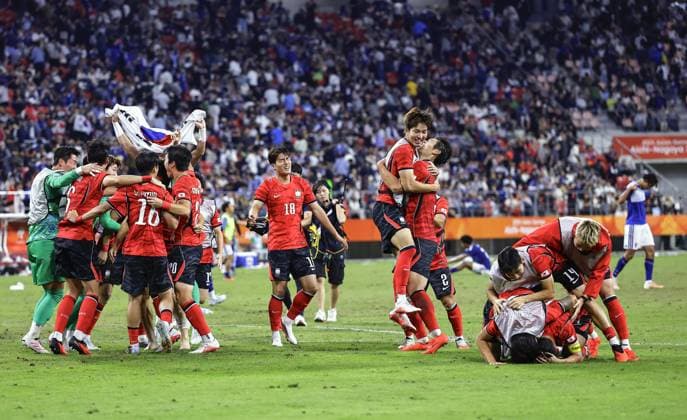 Aichi-Nagoya Asian Games: Football South Korea players celebrate after beating Japan in the Aichi-Nagoya Asian Games men s football final at Toyota Stadium in Toyota in Aichi Prefecture, central Japan, on Oct. 3, 2026.  A14AA0005629885P