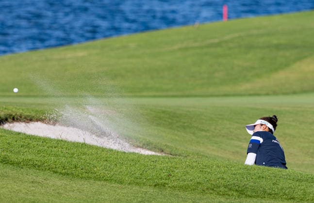 October 3, 2026, Honolulu, Hawaii, USA: MIYU YAMASHITA makes a chip shot from the bunker at the 18th green during Round 3 of the 2026 Lotte Championship at Hoakalei Country Club, Ewa Beach, Hawaii, USA. Honolulu USA - ZUMAm310 20261003_zsp_m310_056 Copyright: xElliotxMilesx
