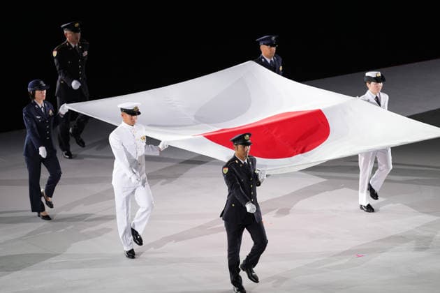 (261004) -- NAGOYA, Oct. 4, 2026 -- Flag bearers carry the national flag of Japan into the stadium during the closing ceremony of the 20th Asian Games Aichi-Nagoya 2026 in Nagoya, Japan, Oct. 4, 2026. ) (SP)JAPAN-NAGOYA-ASIAN GAMES-CLOSING CEREMONY LuoxYuan 