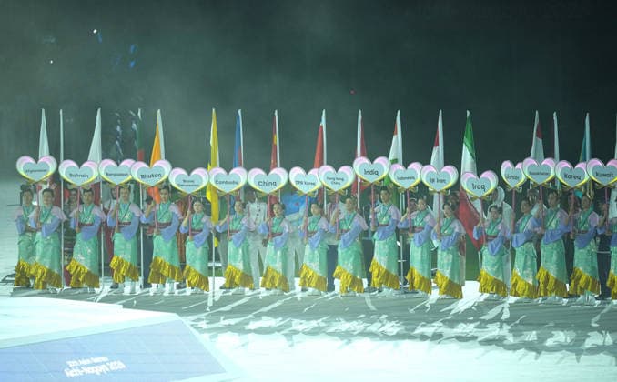(261004) -- NAGOYA, Oct. 4, 2026 -- Flag-bearers of delegations parade into the stadium during the closing ceremony of the 20th Asian Games Aichi-Nagoya 2026 in Nagoya, Japan, Oct. 4, 2026. ) (SP)JAPAN-NAGOYA-ASIAN GAMES-CLOSING CEREMONY CheongxKamxKa 