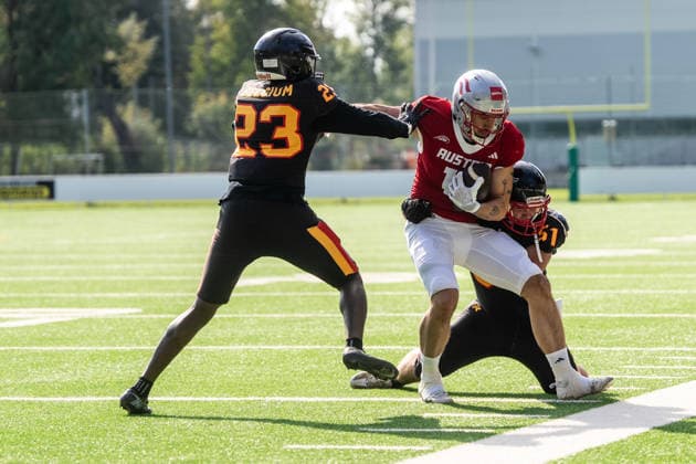 AMERICAN FOOTBALL - IFAF EC, AUT vs BEL SALZBURG,AUSTRIA,04.OCT.26 - AMERICAN FOOTBALL - IFAF European Championship, EM, Europameisterschaft Austria vs Belgium. Image shows Stef Atidzah (BEL) and Philipp Klar (AUT).  GEPAxpictures xJulioxArellano