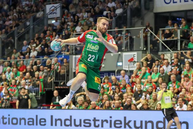 04.10.2026, xgox, Handball - Opel HBL SC Magdeburg - HC Erlangen emspor, v.l. Lukas Mertens (Magdeburg, 22) wirft Tor, Torschuetze, erzielt Tor, Treffer, scores the goal Magdeburg