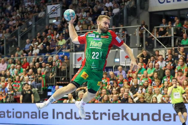 04.10.2026, xgox, Handball - Opel HBL SC Magdeburg - HC Erlangen emspor, v.l. Lukas Mertens (Magdeburg, 22) wirft Tor, Torschuetze, erzielt Tor, Treffer, scores the goal Magdeburg