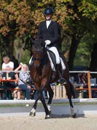 2026.10.04, Deutschland, Ludwigsburg Reiten Dressur Preis der BW - Bank, Siegerin Ann-Kathrin Lindner (RV Ilsfeld) auf Weidners Dark Knight