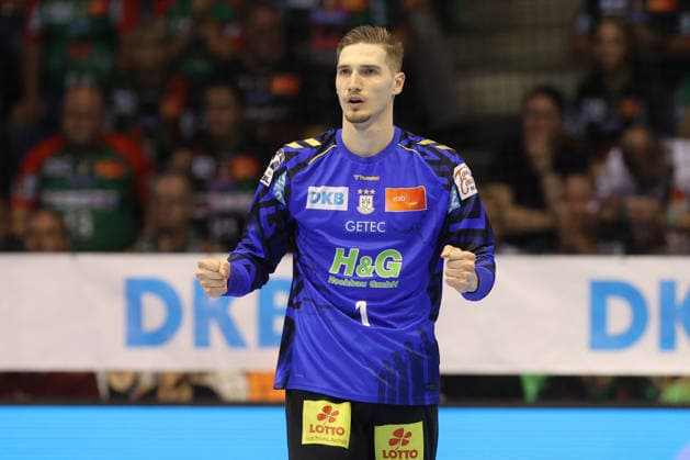 04.10.2026, xtgx, Handball Opel HBL, SC Magdeburg - HC Erlangen emspor, v.l. Dominik Kuzmanovic (Magdeburg, 1) jubelt ueber gehaltenen Ball, abgewehrt, gehalten, Torhueter Magdeburg