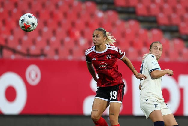 Football Women german Bundesliga 2026 - 2027 1.FC Nurnberg-TSG Hoffenheim Lapassouse Louna of FCN ( L ) and Gloning Laura of Hoffenheim ( R ) fight for the ball during the Women German Bundesliga 2026 - 2027 football match between 1.FC Nurnberg and TSG Hoffenheim at Max Morlock Stadium in Nuremberg , Bayern , Germany . October 04th , 2026 Photo by Davide Elias Copyright: xDavidexEliasx