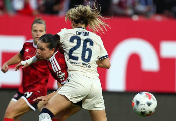 Football Women german Bundesliga 2026 - 2027 1.FC Nurnberg-TSG Hoffenheim Brengel Jonna of FCN ( L ) and Grimm Janna of Hoffenheim ( R ) fight for the ball during the Women German Bundesliga 2026 - 2027 football match between 1.FC Nurnberg and TSG Hoffenheim at Max Morlock Stadium in Nuremberg , Bayern , Germany . October 04th , 2026 Photo by Davide Elias Copyright: xDavidexEliasx