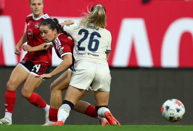 Football Women german Bundesliga 2026 - 2027 1.FC Nurnberg-TSG Hoffenheim Brengel Jonna of FCN ( L ) and Grimm Janna of Hoffenheim ( R ) fight for the ball during the Women German Bundesliga 2026 - 2027 football match between 1.FC Nurnberg and TSG Hoffenheim at Max Morlock Stadium in Nuremberg , Bayern , Germany . October 04th , 2026 Photo by Davide Elias Copyright: xDavidexEliasx