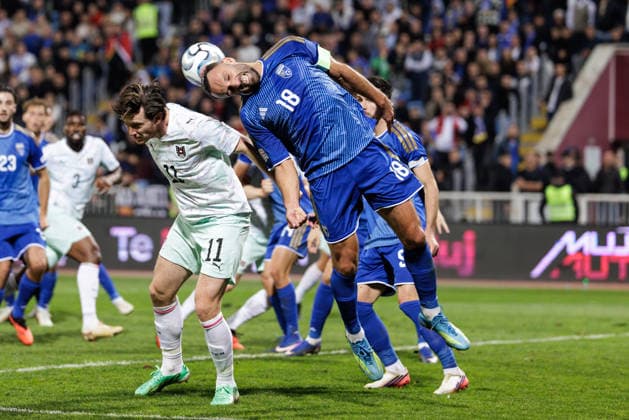 SOCCER - NL, KOS vs AUT PRISTINA,KOSOVO,04.OCT.26 - SOCCER - UEFA Nations League, OEFB international match, Länderspiel, Nationalmannschaft Kosovo vs Austria. Image shows Michael Gregoritsch (AUT) and Vedat Muriqi (KOS).  GEPAxpictures xArminxRauthner