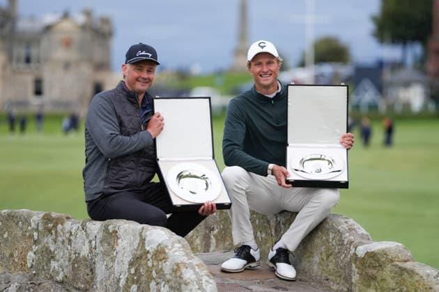 RECORD DATE NOT STATED 4th October 2026; Old Course at St Andrews, St Andrews, Scotland; DP World Tour Golf, Alfred Dunhill Links Championship, Final Day; Tom Chaplin and Adrian Meronk hold the team championship trophy on the Swilcan Bridge AlecxBrown