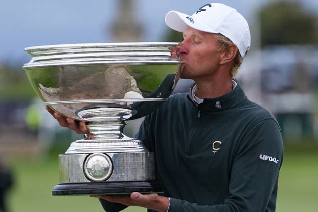RECORD DATE NOT STATED 4th October 2026; Old Course at St Andrews, St Andrews, Scotland; DP World Tour Golf, Alfred Dunhill Links Championship, Final Day; Adrian Meronk kisses the Alfred Dunhill trophy on the Swilcan Bridge after winning the tournament and becoming champion golfer AlecxBrown