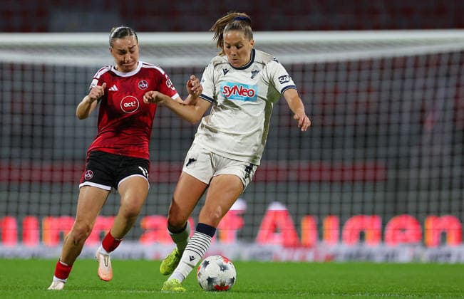 October 4, 2026, Nuremberg, Bayern, Germany: Meroni Lara of FCN ( L ) and Kaut Lisann of Hoffenheim ( R ) fight for the ball during the Women German Bundesliga 2026 - 2027 football match between 1.FC Nurnberg and TSG Hoffenheim at Max Morlock Stadium in Nuremberg , Bayern , Germany . October 04th , 2026 Nuremberg Germany - ZUMAe140 20261004_zip_e140_063 Copyright: xDavidexEliasx