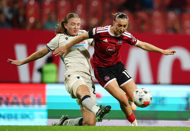 Football Women german Bundesliga 2026 - 2027 1.FC Nurnberg-TSG Hoffenheim van de Velde Jonna of Hoffenheim ( L ) and Meroni Lara of FCN ( R ) fight for the ball during the Women German Bundesliga 2026 - 2027 football match between 1.FC Nurnberg and TSG Hoffenheim at Max Morlock Stadium in Nuremberg , Bayern , Germany . October 04th , 2026 Photo by Davide Elias Copyright: xDavidexEliasx