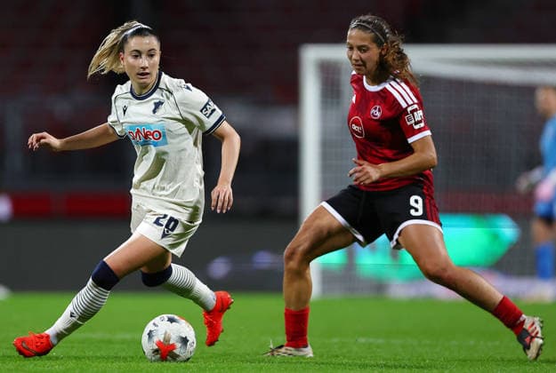 Football Women german Bundesliga 2026 - 2027 1.FC Nurnberg-TSG Hoffenheim Grimm Janna of Hoffenheim ( L ) and Miller Laura of FCN ( R ) fight for the ball during the Women German Bundesliga 2026 - 2027 football match between 1.FC Nurnberg and TSG Hoffenheim at Max Morlock Stadium in Nuremberg , Bayern , Germany . October 04th , 2026 Photo by Davide Elias Copyright: xDavidexEliasx