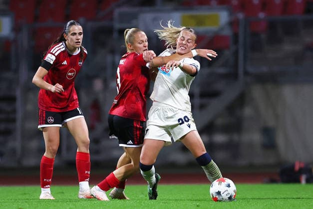 Football Women german Bundesliga 2026 - 2027 1.FC Nurnberg-TSG Hoffenheim Proniez Fany of FCN ( L ) and Gloning Laura of Hoffenheim ( R ) fight for the ball during the Women German Bundesliga 2026 - 2027 football match between 1.FC Nurnberg and TSG Hoffenheim at Max Morlock Stadium in Nuremberg , Bayern , Germany . October 04th , 2026 Photo by Davide Elias Copyright: xDavidexEliasx