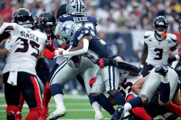 October 4, 2026, Houston, Texas, U.S: Dallas Cowboys running back Javonte Williams (33) is tackled by Houston Texans defensive end Danielle Hunter (55) while carrying the ball during the first quarter of the NFL, American Football Herren, USA regular season game between the Houston Texans and the Dallas Cowboys at Reliant Stadium in Houston, TX on October 4, 2026. Houston U.S - ZUMAw137 20261004_aap_w137_043 Copyright: xErikxWilliamsx