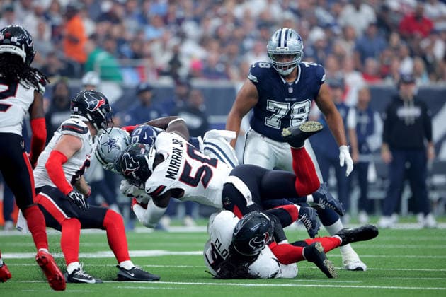 October 4, 2026, Houston, Texas, U.S: Houston Texans defensive end Kenneth Murray Jr. (50) tackles Dallas Cowboys running back Javonte Williams (33) on a running play during the first quarter of the NFL, American Football Herren, USA regular season game between the Houston Texans and the Dallas Cowboys at Reliant Stadium in Houston, TX on October 4, 2026. Houston U.S - ZUMAw137 20261004_aap_w137_045 Copyright: xErikxWilliamsx