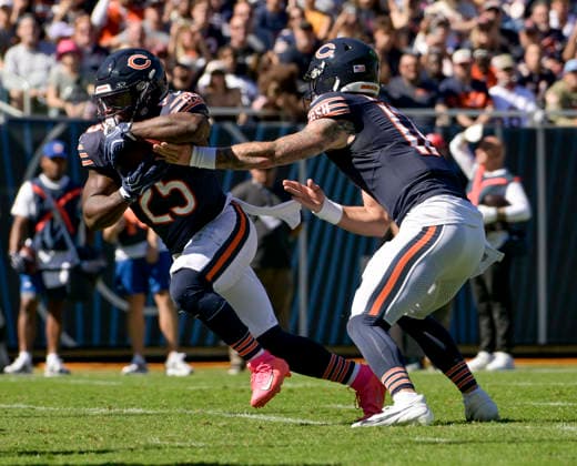 Chicago Bears running back Kyle Monangai (25) takes the hand off from quarterback Tyson Bagent (17) against the New York Jets at Soldier Field in Chicago on Sunday, October 4, 2026.  CHI20261004102 MARKxBLACK