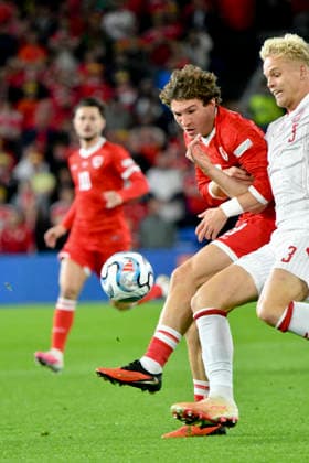 Football - 2026 2027 UEFA Nations League - League A, Group Four: Wales vs. Denmark - Cardiff City Stadium - Sunday 4th October 2026 Wes Burns WALES & Oliver Provstgaard DENMARK colorsport winston bynorth 