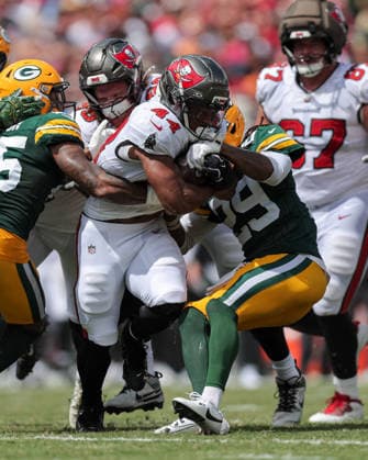 Oct 4, 2026; Tampa, FL, USA; Tampa Bay Buccaneers running back Sean Tucker (44) fights for a first down on a 4th & 1 during the NFL, American Football Herren, USA game between the Green Bay Packers and Tampa Bay Buccaneers at Raymond James Stadium. Mandatory Credit: Taylor McFee-Cal Media NFL 2026: Packers Vs Buccaneers OCT 04  - ZUMAc04_ 20261004_zma_c04_068 Copyright: xTaylorxMcfeex