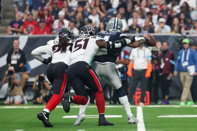 HOUSTON, TX - OCTOBER 04: Defensive end Jadeveon Clowney 90 of the Houston Texans and defensive end Will Anderson Jr. 51 of the Houston Texans force an intentional grounding penalty as they get to quarterback Dak Prescott 4 of the Dallas Cowboys during the NFL, American Football Herren, USA football game between the Houston Texans and Dallas Cowboys on October 4, 2026, at Reliant Stadium in Houston, TX. (Photo by David Buono Icon Sportswire) NFL: OCT 04 Cowboys at Texans EDITORIAL USE ONLY Icon241004018