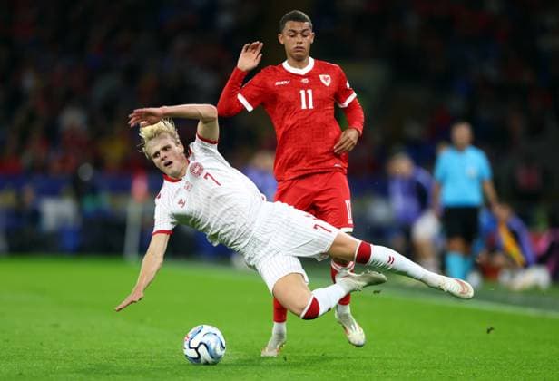 Victor Froholdt of Denmark is fouled by Brennan Johnson of Wales Wales v Denmark, UEFA Nations League, Football, Cardiff City Stadium, Cardiff, UK - 04 Oct 2026Cardiff Cardiff City Stadium United Kingdom  Copyright: xKieranxMcManus Shutterstockx 17185536o