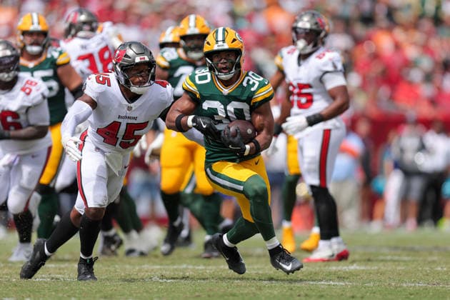 Oct 4, 2026; Tampa, FL, USA; Green Bay Packers running back Chris Brooks (30) runs the ball during the NFL, American Football Herren, USA game between the Green Bay Packers and Tampa Bay Buccaneers at Raymond James Stadium. Mandatory Credit: Taylor McFee-Cal Media Tampa USA - ZUMAc04_ 20261004_zma_c04_047 Copyright: xTaylorxMcfeex