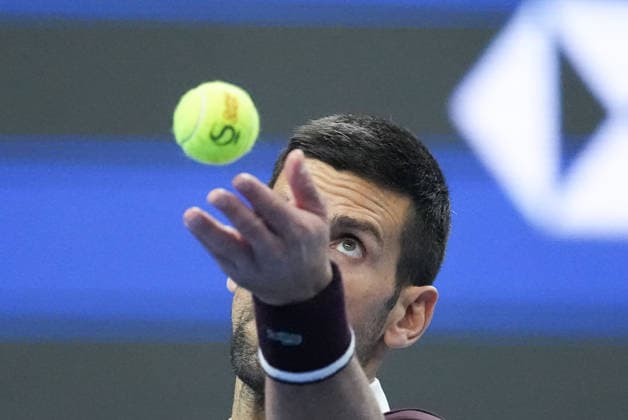 (261004) -- BEIJING, Oct. 4, 2026 -- Novak Djokovic serves during the men s singles quarterfinal match between Alexander Zverev of Germany and Novak Djokovic of Serbia at 2026 China Open tennis tournament in Beijing, China, Oct. 4, 2026. ) (SP)CHINA-BEIJING-TENNIS-CHINA OPEN-MEN S SINGLES(CN) JuxHuanzong 