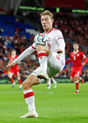 Cardiff, Wales, 4th October 2026. Rasmus Hojlund of Denmark controls the ball during the Wales vs Denmark UEFA Nations League match at the Cardiff City Stadium, Cardiff. Picture credit should read: Cody Froggatt Sportimage EDITORIAL USE ONLY. No use with unauthorised audio, video, data, fixture lists, club league logos or live services. Online in-match use limited to 120 images, no video emulation. No use in betting, games or single club league player publications. SPI_030_CF_WALES_V_DENMARK SPI-5051-0030