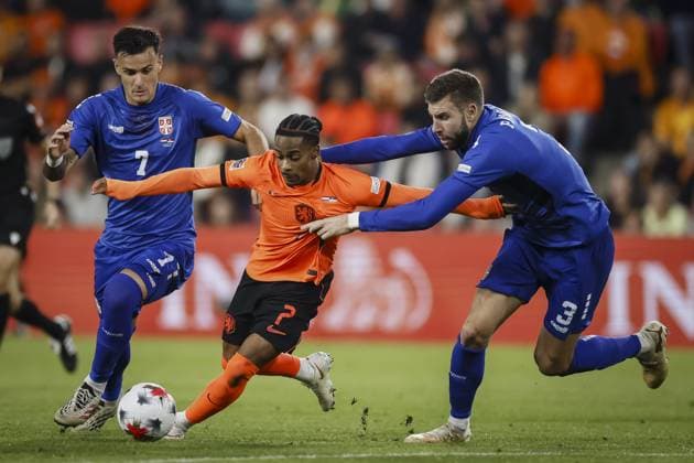 EINDHOVEN - (lr) Aleksandar Stankovic of Serbia, Crysencio Summerville of the Netherlands and Strahinja Pavlovic of Serbia during the UEFA Nations League match between the Netherlands and Serbia at the Philips Stadium on 4 October 2026 in Eindhoven, the Netherlands. KOEN VAN WEEL ANP xVIxANPxSportx xxANPxIVx 571523723 originalFilename: 571523723.jpg
