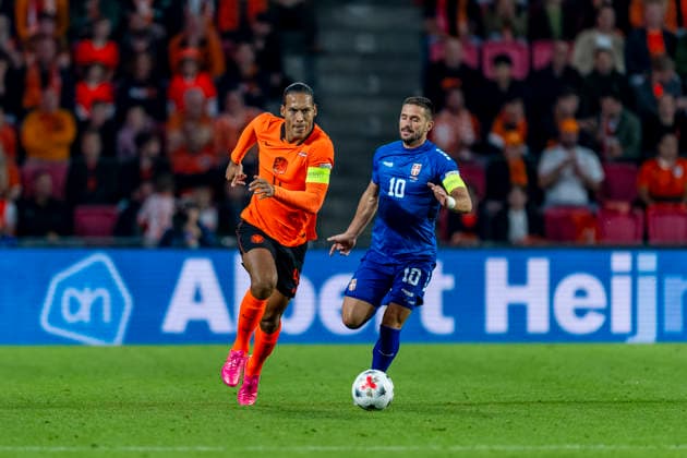 EINDHOVEN - (l-r) Nederland defender Virgil van Dijk and Servie forward Dusan Tadic during the UEFA Nations League match between Nederland and Servie at Philips Stadion on 4 oktober 2026 in Eindhoven, Nederland. (Photo by DeFodi Images) -