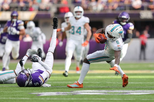 MINNEAPOLIS, MN - OCTOBER 04: Minnesota Vikings cornerback Zemaiah Vaughn (5) tackles Miami Dolphins wide receiver Malik Washington (6) during the first half of the NFL, American Football Herren, USA game between the Miami Dolphins and the Minnesota Vikings on October 4th, 2026, at U.S. Bank Stadium in Minneapolis, MN. (Photo by Bailey Hillesheim Icon Sportswire) NFL: OCT 04 Dolphins at Vikings EDITORIAL USE ONLY Icon20261004020