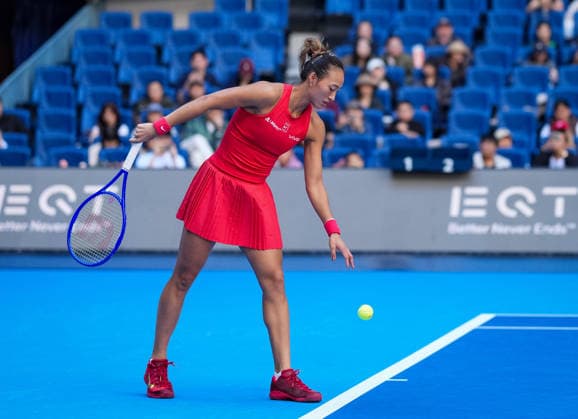 (261005) -- BEIJING, Oct. 5, 2026 -- Zheng Qinwen of China prepares to serve during the women s singles round of 32 match against Marie Bouzkova of the Czech Republic at 2026 China Open tennis tournament in Beijing, China, Oct. 5, 2026. ) (SP)CHINA-BEIJING-TENNIS-CHINA OPEN-WOMEN S SINGLES(CN) SunxFei 