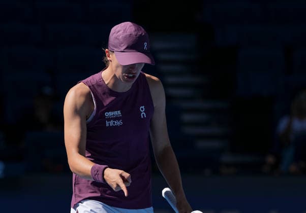 (261005) -- BEIJING, Oct. 5, 2026 -- Iga Swiatek of Poland reacts during the women s singles round of 32 match against Donna Vekic of Croatia at 2026 China Open tennis tournament in Beijing, China, Oct. 5, 2026. ) (SP)CHINA-BEIJING-TENNIS-CHINA OPEN-WOMEN S SINGLES(CN) SunxFei 