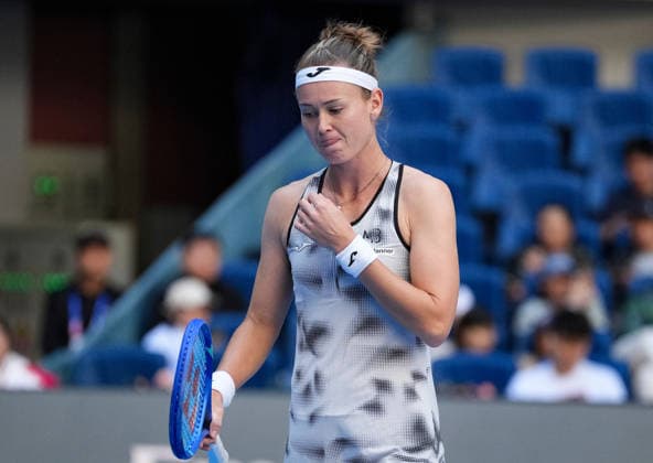 (261005) -- BEIJING, Oct. 5, 2026 -- Marie Bouzkova of the Czech Republic reacts during the women s singles round of 32 match against Zheng Qinwen of China at 2026 China Open tennis tournament in Beijing, China, Oct. 5, 2026. ) (SP)CHINA-BEIJING-TENNIS-CHINA OPEN-WOMEN S SINGLES(CN) SunxFei 