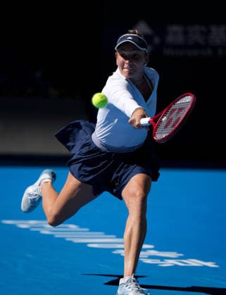 (261005) -- BEIJING, Oct. 5, 2026 -- Donna Vekic of Croatia hits a return during the women s singles round of 32 match against Iga Swiatek of Poland at 2026 China Open tennis tournament in Beijing, China, Oct. 5, 2026. ) (SP)CHINA-BEIJING-TENNIS-CHINA OPEN-WOMEN S SINGLES(CN) SunxFei 