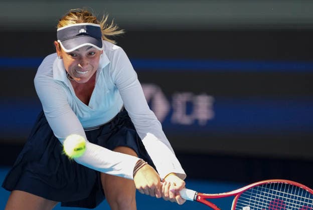 (261005) -- BEIJING, Oct. 5, 2026 -- Donna Vekic of Croatia hits a return during the women s singles round of 32 match against Iga Swiatek of Poland at 2026 China Open tennis tournament in Beijing, China, Oct. 5, 2026. ) (SP)CHINA-BEIJING-TENNIS-CHINA OPEN-WOMEN S SINGLES(CN) SunxFei 
