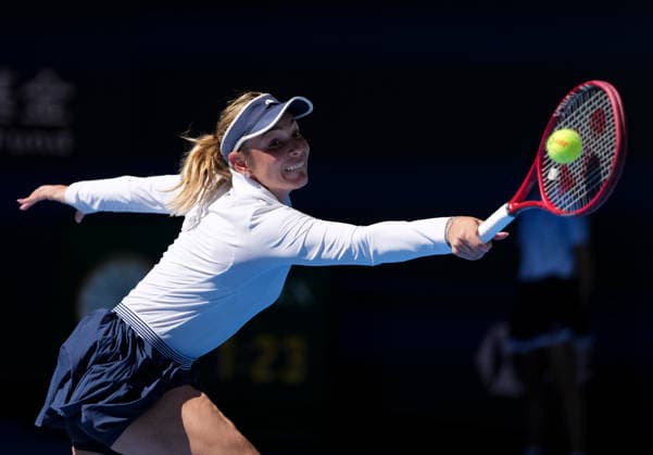 (261005) -- BEIJING, Oct. 5, 2026 -- Donna Vekic of Croatia hits a return during the women s singles round of 32 match against Iga Swiatek of Poland at 2026 China Open tennis tournament in Beijing, China, Oct. 5, 2026. ) (SP)CHINA-BEIJING-TENNIS-CHINA OPEN-WOMEN S SINGLES(CN) SunxFei 