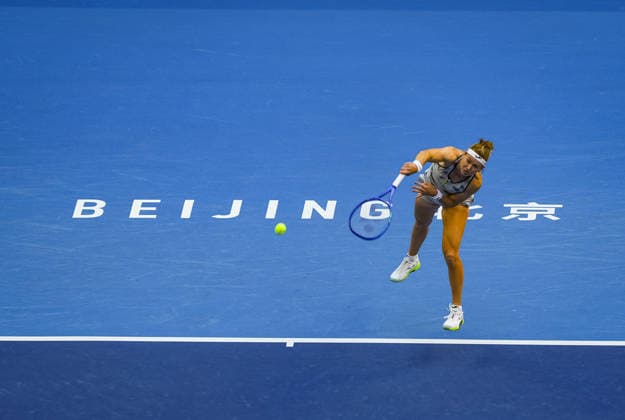(261005) -- BEIJING, Oct. 5, 2026 -- Marie Bouzkova of the Czech Republic hits a return during the women s singles round of 32 match against Zheng Qinwen of China at 2026 China Open tennis tournament in Beijing, China, Oct. 5, 2026. ) (SP)CHINA-BEIJING-TENNIS-CHINA OPEN-WOMEN S SINGLES(CN) SunxFei 