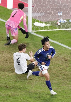Football: Kirin Cup Japan s Ayase Ueda (front) reacts after scoring in the first half of the Kirin Cup football final against New Zealand at MUFG Stadium in Tokyo on Oct. 5, 2026.  A14AA0005630190P