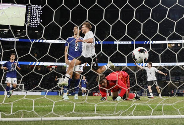 Football: Kirin Cup Japan goalkeeper Zion Suzuki (bottom) reacts after conceding a goal in the first half of the Kirin Cup football final against New Zealand at MUFG Stadium in Tokyo on Oct. 5, 2026.  A14AA0005630193P