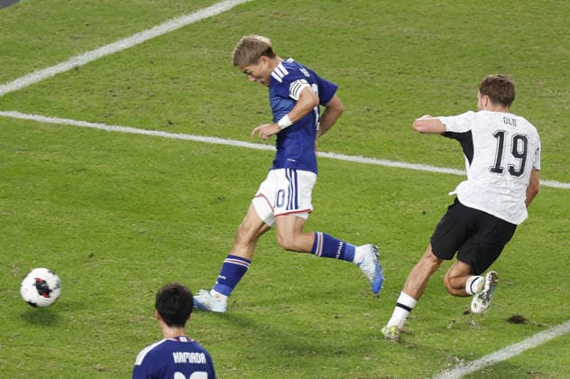 Football: Kirin Cup Japan s Ritsu Doan (L) scores in the second half of the Kirin Cup football final against New Zealand at MUFG Stadium in Tokyo on Oct. 5, 2026.  A14AA0005630195P