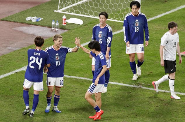 Football: Kirin Cup Japan s Ritsu Doan (10) celebrates with teammates after scoring in the second half of the Kirin Cup football final against New Zealand at MUFG Stadium in Tokyo on Oct. 5, 2026.  A14AA0005630196P